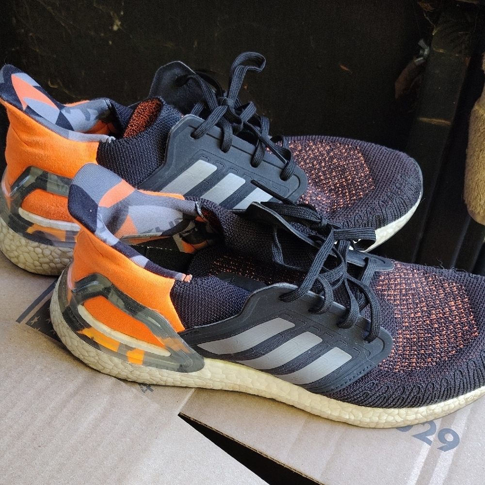 Adidas Black and Orange Athletic Shoes with Boost Cushioning